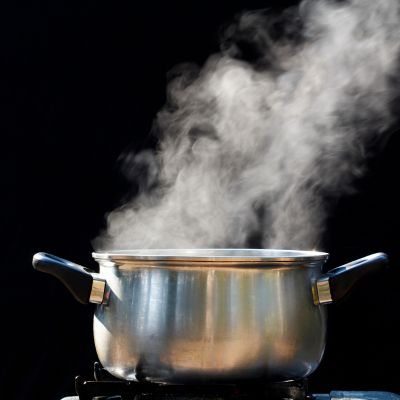 Boiling water example of internal energy increase